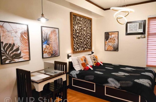 Muntinlupa Apartment | Queen Bed Deluxe- Contemporary Style
