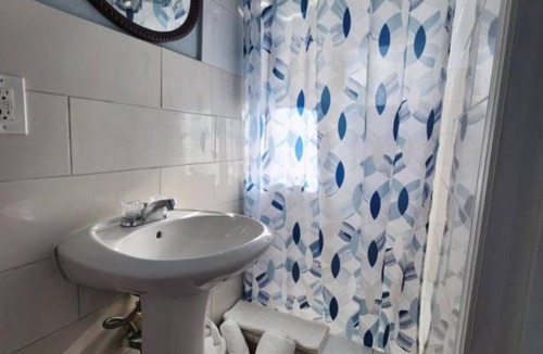 Rolle Town Cabin | Queen Room with Garden View