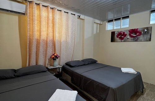 Port of Spain House | Queen's Comfort Inn