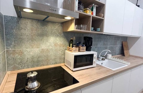 Quartiere XI Portuense Apartment | Quiet 3 bed, 3 bath apartment in the heart of Rome. 5 Minutes from the Station