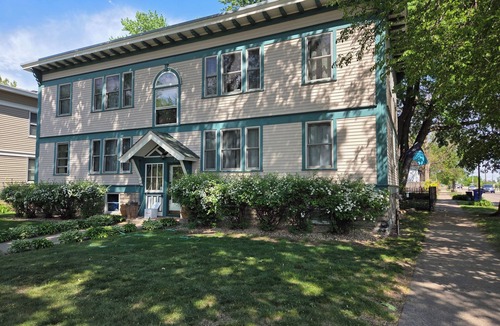 Merriam Park Apartment | Quiet Balcony midst lilac trees awaits! Sleeps 4, dog and child friendly!