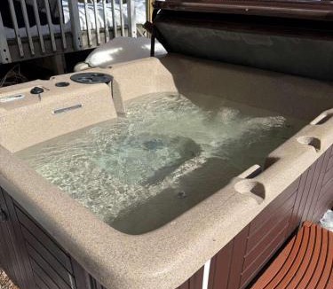 South Russell Apartment | Quiet Guest Space with Hot Tub, Laundry, and Gym