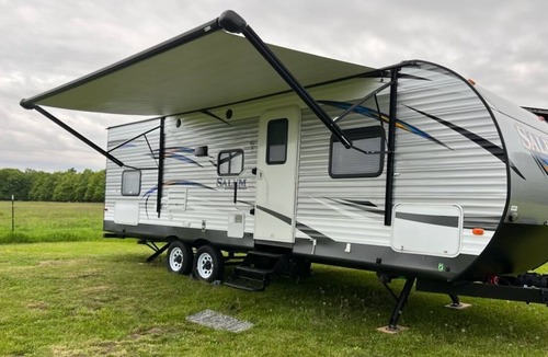 Washington Island House | Quiet island camping! Family sized camper with updated appliances!