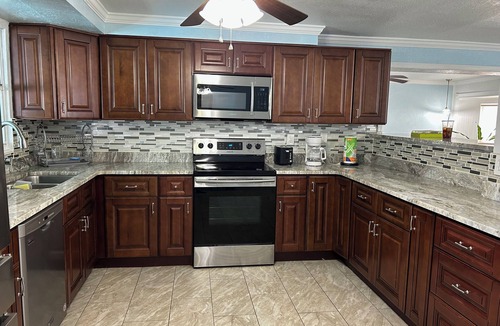 Pinellas Park House | Quiet Pool Haven: 4BR - 9PPL, AC, WiFi, and Beaches Nearby