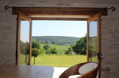Brimpsfield House | Quiet16th Century Cotswold Barn, refurbished. Panoramic views on organic farm
