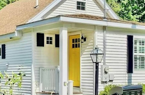 Meredith Cottage | Quintessential lakeside cottage with swimming, picnic tables, & mountain view
