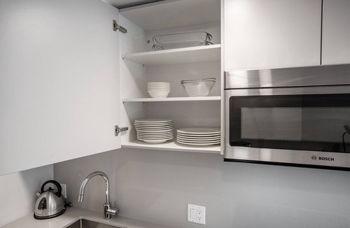 Mid-Cambridge Apartment | Rad Harvard Sq 1BR w/Balcony, near Shops & Campus, by Blueground