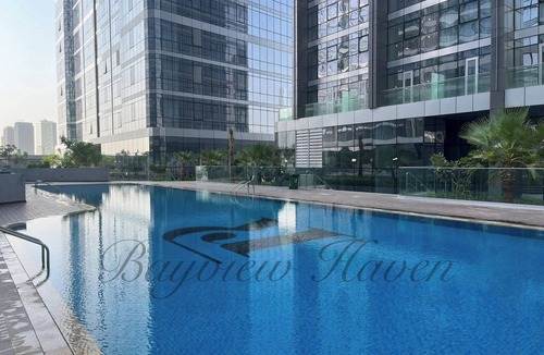 Abu Dhabi Apartment | Radiant Bayview Haven - Canal Side Residence w/1King,2Queen,2Twinbeds,Pool, Gym