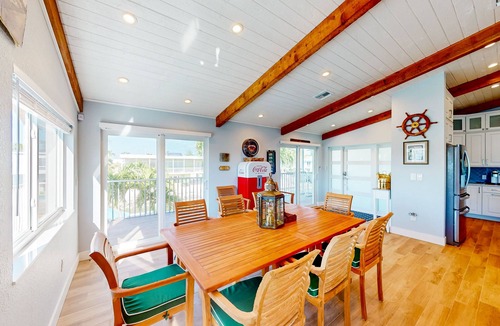 Toll Gate Shores House | Radiant waterfront retreat with remarkable views, patio, tennis court, & grill