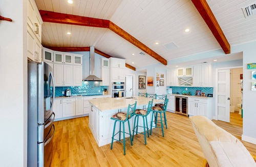 Toll Gate Shores House | Radiant waterfront retreat with remarkable views, patio, tennis court, & grill
