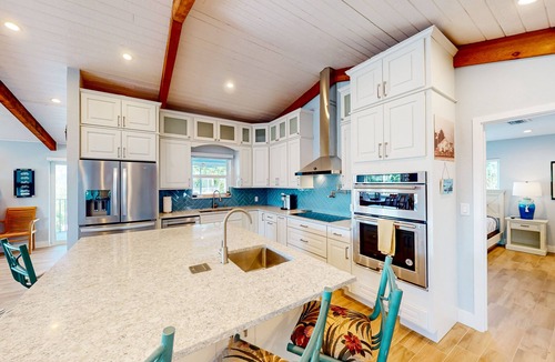 Toll Gate Shores House | Radiant waterfront retreat with remarkable views, patio, tennis court, & grill