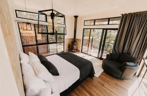 Mount Cotton Apartment | Rainforest Gardens - Luxury Hillside Accomodation with Views to Bay & Islands