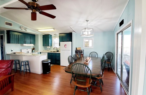 Colington Cottage | Rare Historic Beach Box on quiet street in heart of KDH! 2 min walk to beach!