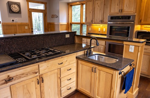 Two Harbors House | Rare large contemporary four bedroom home with forest and lake views + EV Charge