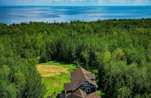 Two Harbors House | Rare large contemporary four bedroom home with forest and lake views + EV Charge