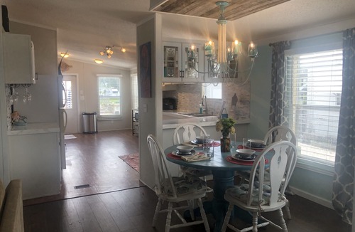 South Waterfront Park House | Reel Paradise Cottage- Canal Front- Bring your Boat to our 50’ Dock!