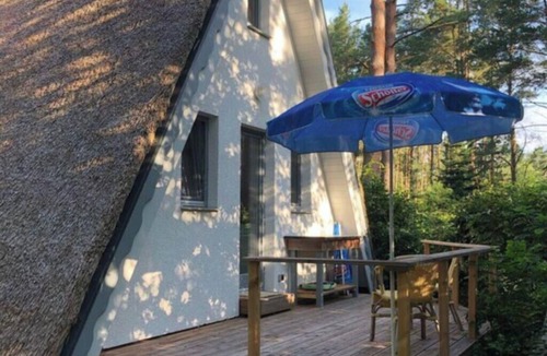 Milmersdorf House | Reetdach Ferienhaus am Lübbesee Sauna Bootsteg neu by Interhome