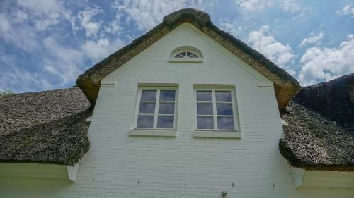 Toenning House | Reetdachhaus Dünenwarft
