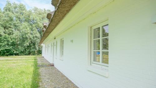 Toenning House | Reetdachhaus Dünenwarft