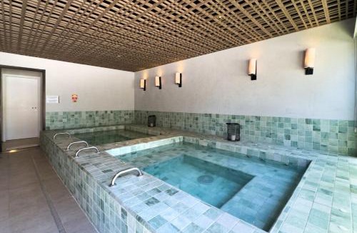 Jardim das Bandeiras Apartment | Refúgio Moderno com Varanda - Wecare Hosting