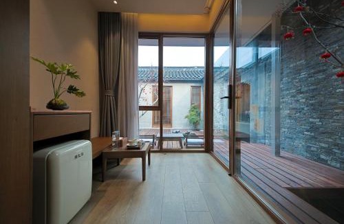 Guangling Qu Hotel | Refactoring Bingouguan Humanities Holiday Hotel (Yangzhou Dongguan Street)