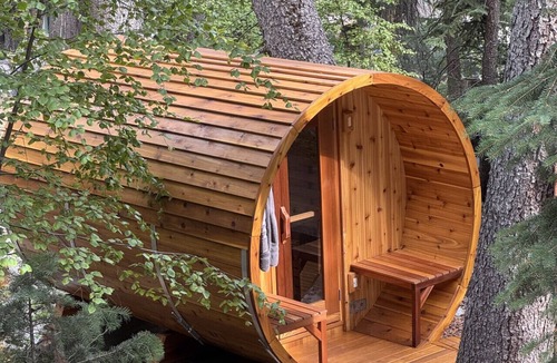 Sundance Cabin | Refined creekside retreat Barrel sauna overlooking the river Hot tub Firelit evenings Minutes to Sundance