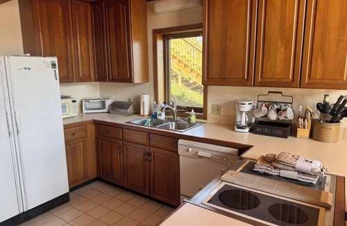 Romulus House | Relax at Poplar Beach Retreat on the sparkling waters of Cayuga Lake. This charming waterfront escape combines rustic character with bright, comfortable living spaces, creating the perfect setting for a relaxing Finger Lakes getaway.