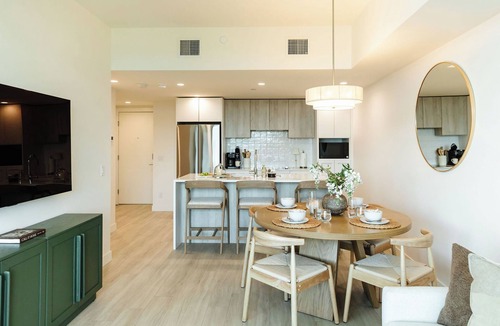 South Pandosy Condo | Relax in a modern 2 bedroom lakefront condo at Aqua Waterfront Village. You get lake views, stylish interiors, a pool, hot tub, gym, secure parking, plus quick access to wineries, cafés, trails & beaches. Perfect for a peaceful Kelowna getaway.