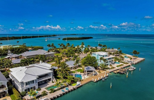 Toll Gate Shores House | Relax in Sunset Cottage, bayfront 4BR pool home retreat in picturesque Islamorada.