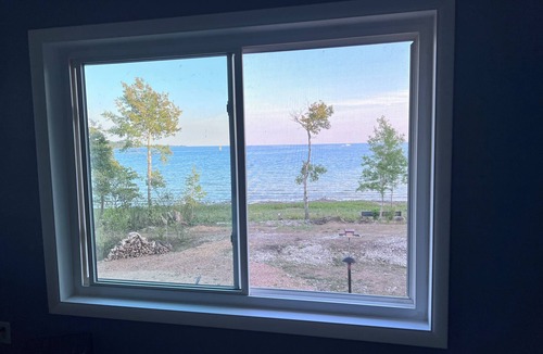Washington Island House | Relax lakeside, watch the ferry boats go by as you listen to the waves roll in.