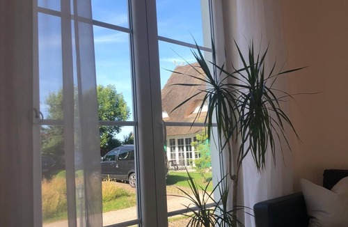 Rerik House | Relax under thatch with sauna, fireplace and sea - 5 star holiday home