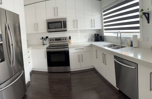 Airdrie House | Relax & unwind in this cozy 3-Bedroom Airdrie Townhome