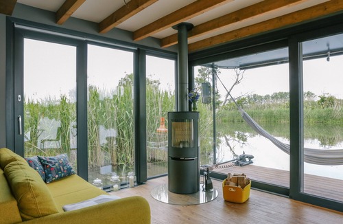 Bad Freienwalde Boat Rental | Relaxation on the water! 50sqm luxury houseboat in the middle of the nature of the Oderbruch