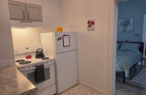 Topeka Apartment | Relaxing Downtown 1 Bed, Dog Friendly Apartment with Deck, Dog Exercise Area