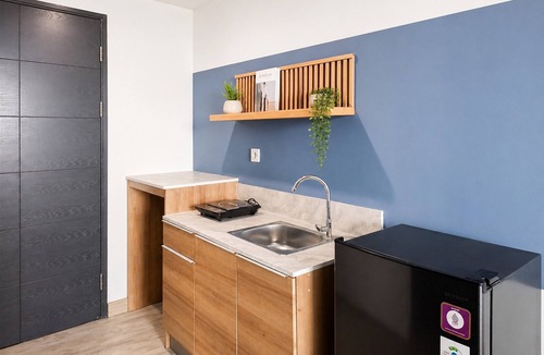 Panunggangan Utara Apartment | Relaxing With Chic Design Studio Apartment At Collins Boulevard