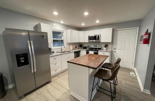 Manchester House | Remodeled Cottage With Sunroom