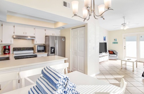 Holmes Beach House | Remodeled duplex with heated private pool - close to beach, dogs welcome