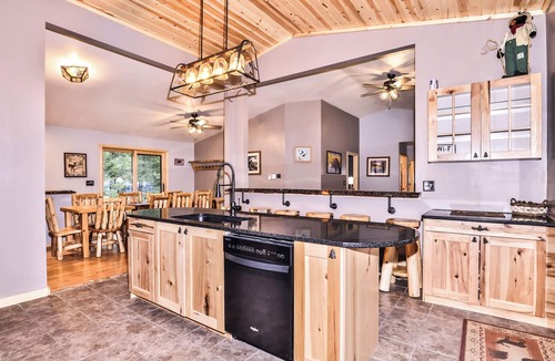 St Germain House | Remodeled lakeside resort lodge with fireplace, sandy beach, dock, firepit!