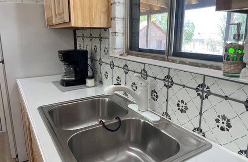Cliff House | Remodeled mid-century brick house is excellent base for exploring the Gila