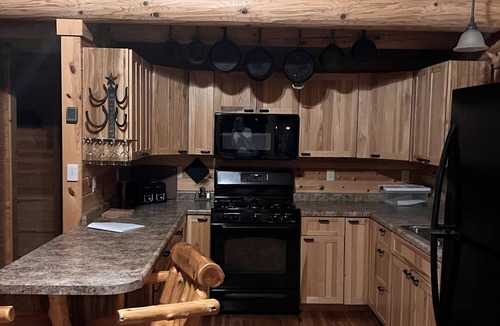 Champion Cabin | Remote log lodge in the Huron Mountain foothills.