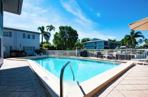 Royal Harbor Condo | RENOVATED 2 Bed, 2 Bath 1st floor with heated pool on the bay!
