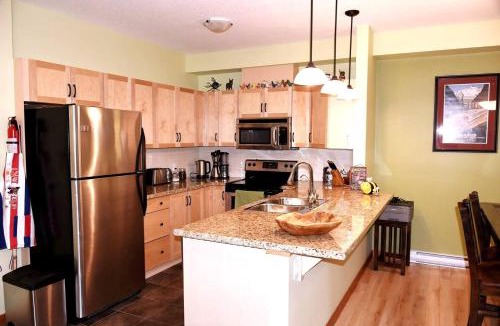 Canmore Apartment | Renovated 2BR, Heated Pool, 3 Hot Tubs, Pets ok!