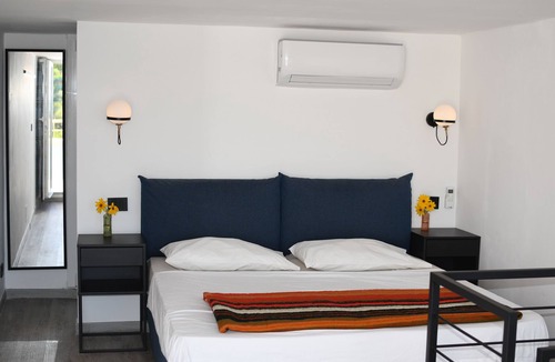 Quercianella Resort | Renovated beach apartment with direct sea access, in vacation complex with pool