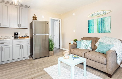 Cottage Line House | Renovated Furnished Bay Front Apartment Building with Private Beach Access