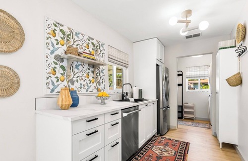 Mount Dora Apartment | Renovated Mount Dora 1BR/1BA duplex in Historic Neighborhood, near Downtown! Walk to shops & dining. Features fast WiFi, workspace, patio, free parking, and boat parking—perfect for work or getaway.