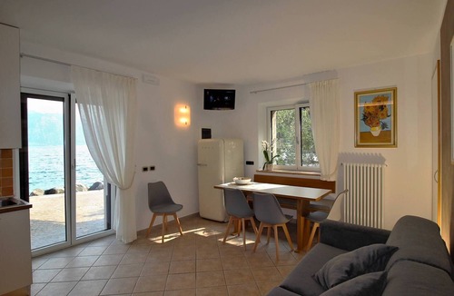 Cassone Apartment | Renovated rustic house directly on the lake. CIR:023045-LOC-00204