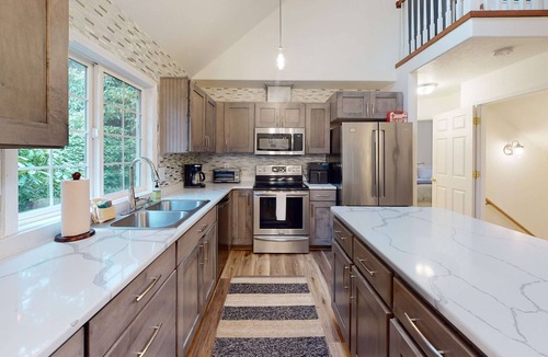 Cape Meares House | Renovated three story home by the beach with a furnished deck and washer dryer
