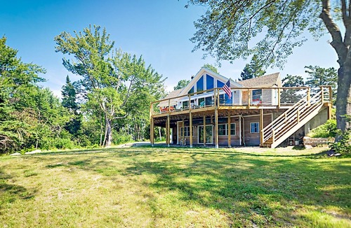 Lamoine Beach Cottage | Renovated waterfront cottage with expansive deck, multiple fireplaces, & grill