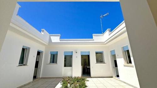 Marina di Mancaversa Ski Chalet | Residence La Corte by Salento Affitti