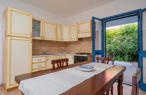 Monte Petrosu Apartment | Residence La Tartaruga Garden with swimming pool